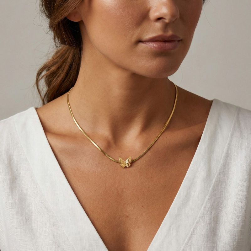 Gold Stainless Steel Butterfly Snake Bone Necklace