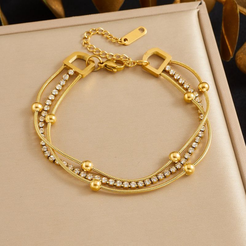 Gold Stainless Steel Multi-bead Bracelet With Diamonds