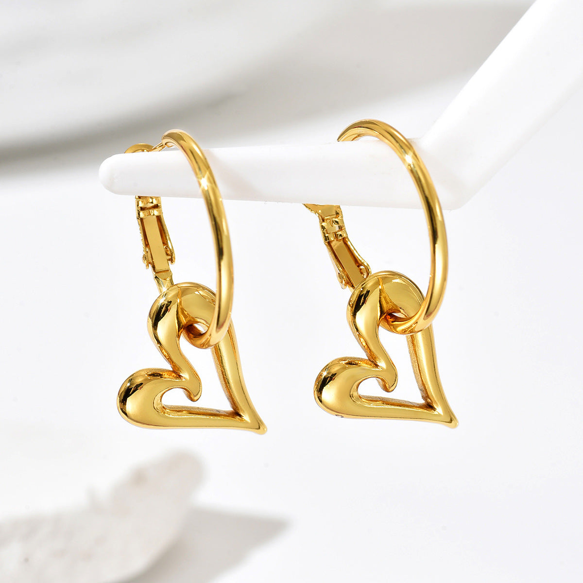 Gold Sweet And Cute Hollow Heart-shaped Earrings With Gold-plated Heart Pendant Unique Design Perfect For Everyday Wear.