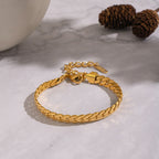 Gold Stainless Steel Cuban Chain Bracelet With Vacuum Plating Of 18k Gold For A Luxurious And Color-preserving Finish.