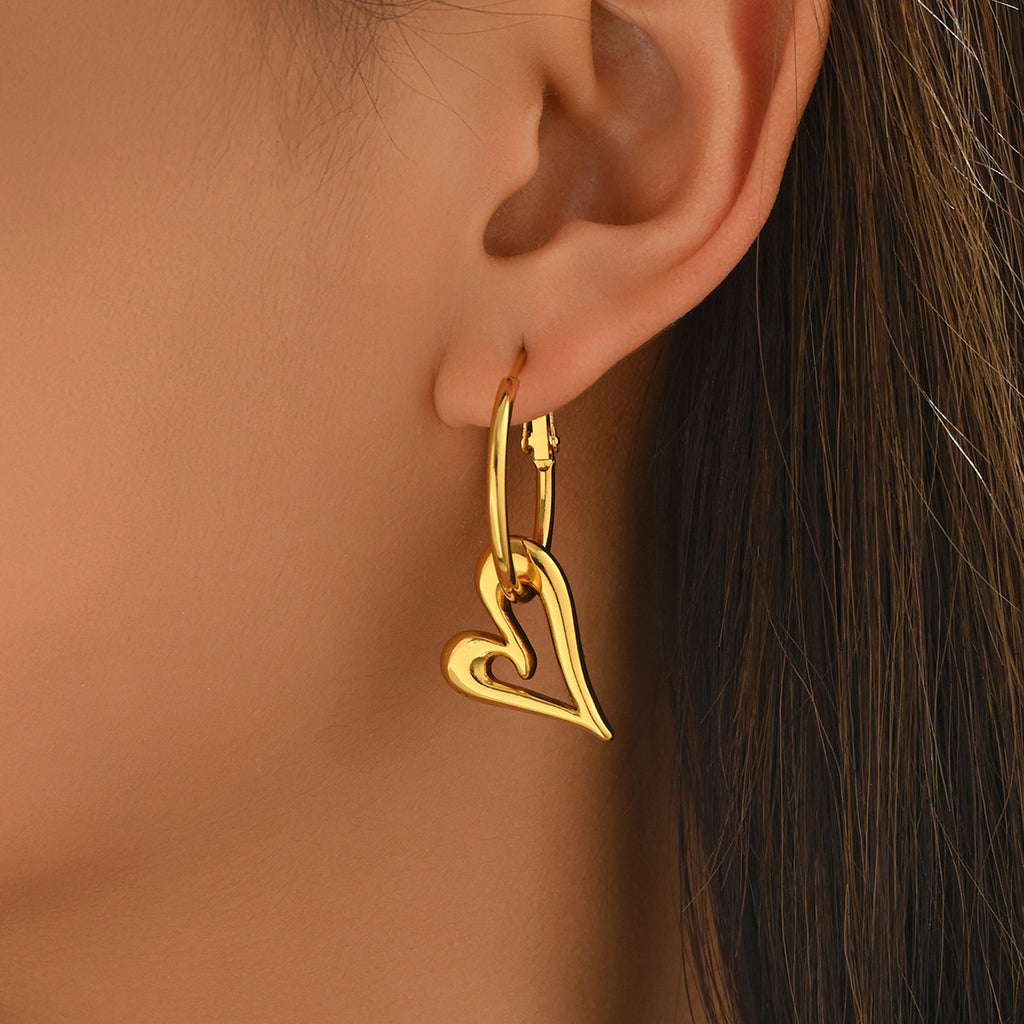 Gold Sweet And Cute Hollow Heart-shaped Earrings With Gold-plated Heart Pendant Unique Design Perfect For Everyday Wear.