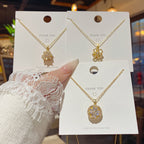 Gold #1 Rotatable Four-leaf Flower Pendant Necklace