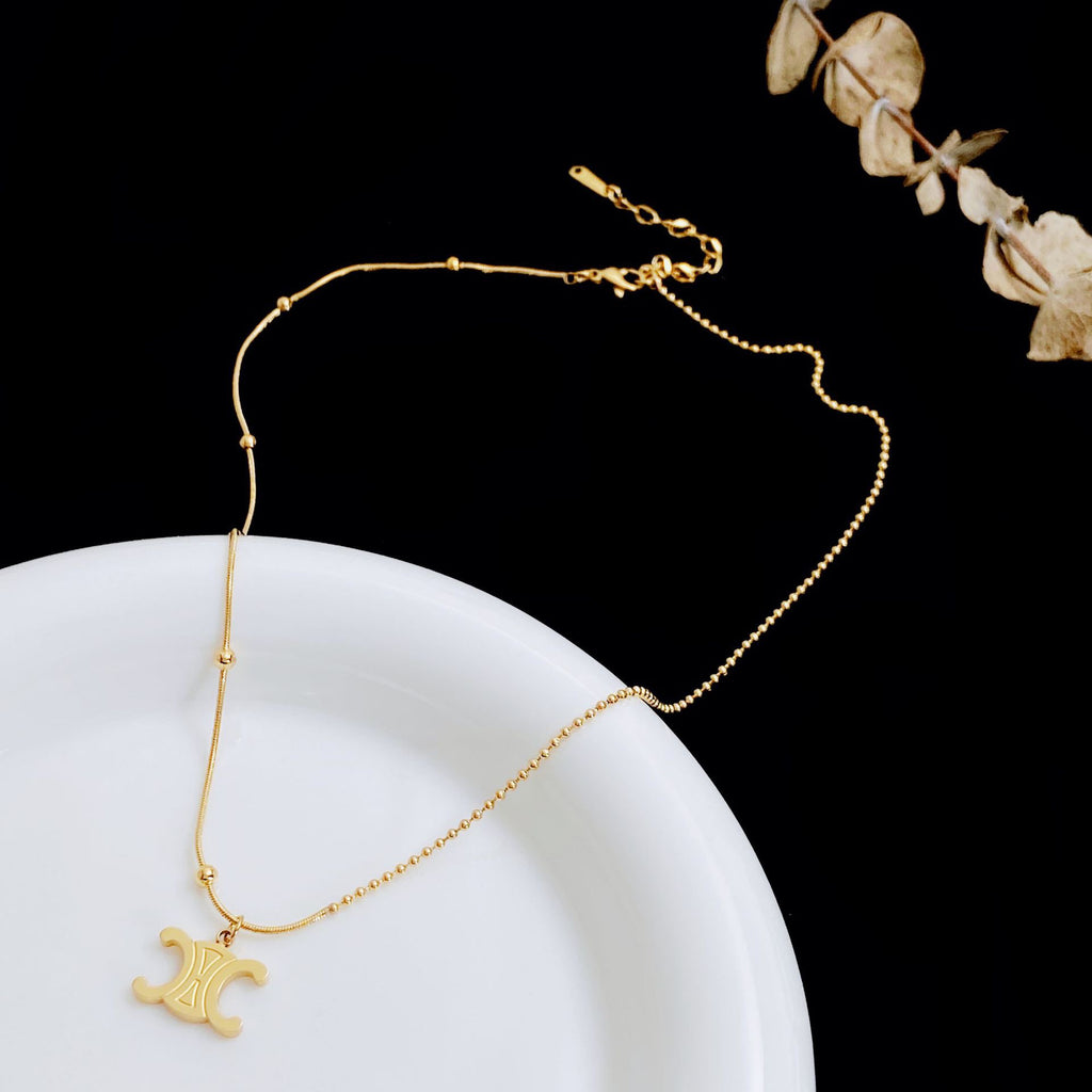 Fashion Gold Titanium Steel Arc De Triomphe Necklace