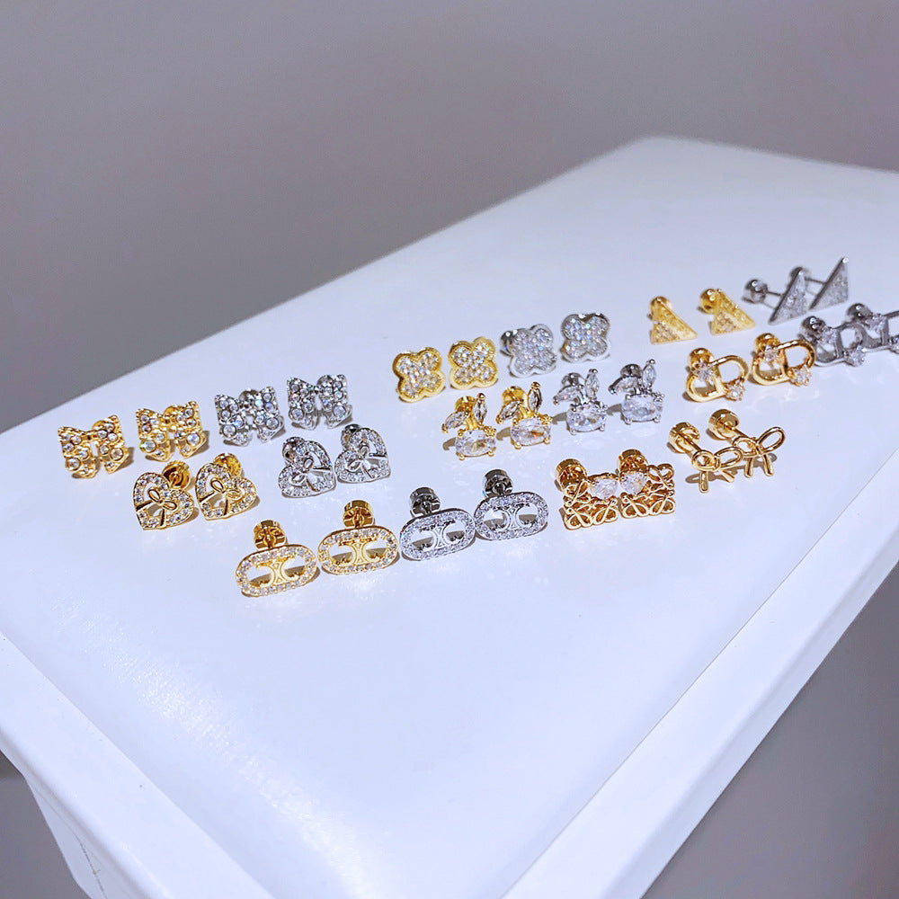 Golden Curved-ear Rabbit Titanium Steel Diamond-encrusted Rabbit Earrings